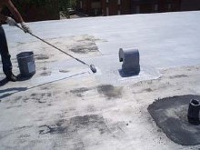 Worker on Flat Roof